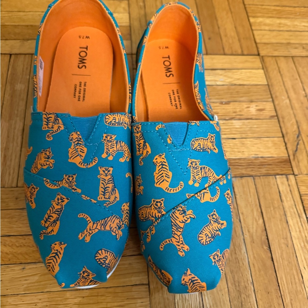 Toms Blue Slip-Ons with Orange Tiger Design